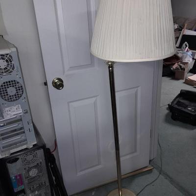 Brass Floor lamp with adjustable swing movement and lamp shade