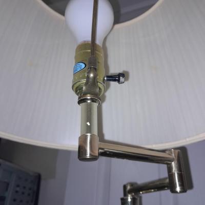 Brass Floor lamp with adjustable swing movement and lamp shade