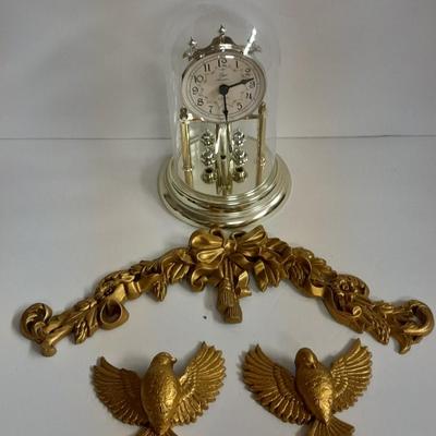 Elgin American Quartz Anniversary clock with globe, and MCM wall hangings