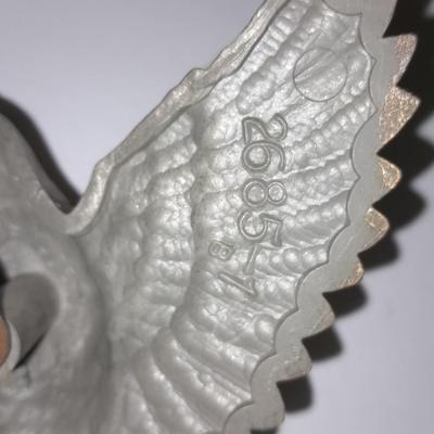 Elgin American Quartz Anniversary clock with globe, and MCM wall hangings