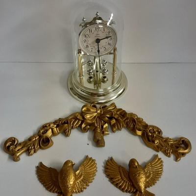 Elgin American Quartz Anniversary clock with globe, and MCM wall hangings