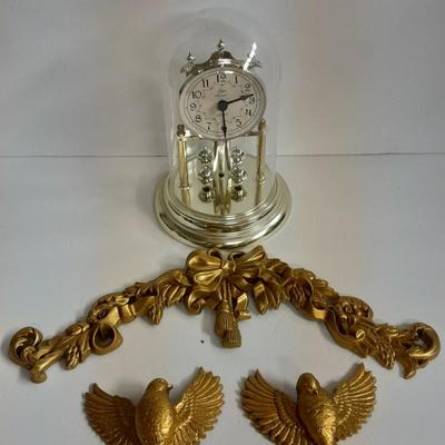 Elgin American Quartz Anniversary clock with globe, and MCM wall hangings