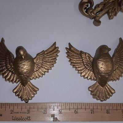 Elgin American Quartz Anniversary clock with globe, and MCM wall hangings