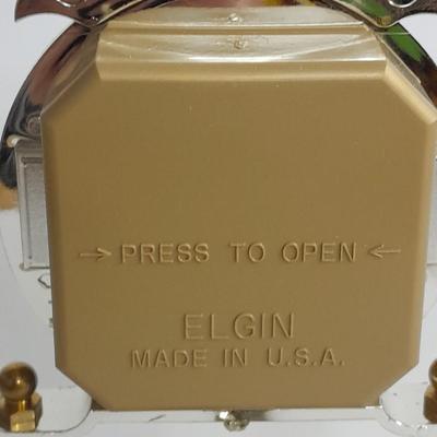 Elgin American Quartz Anniversary clock with globe, and MCM wall hangings