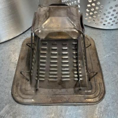 Large aluminum pot with strainer and campfire toaster