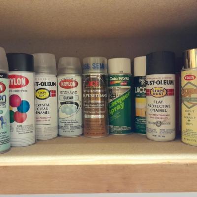 Assortment of Spray paints, full to nearly full bottles and lacquer and primers