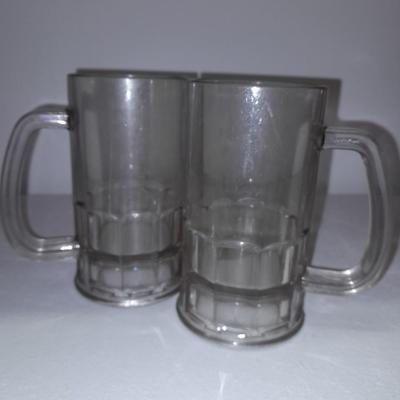Etched ship drinking glasses with plastic handled drinking mugs.
