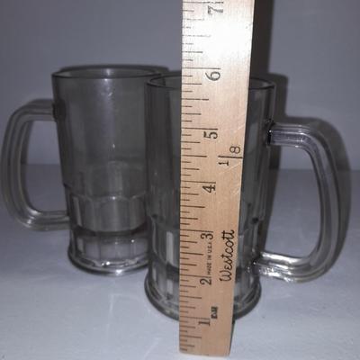 Etched ship drinking glasses with plastic handled drinking mugs.