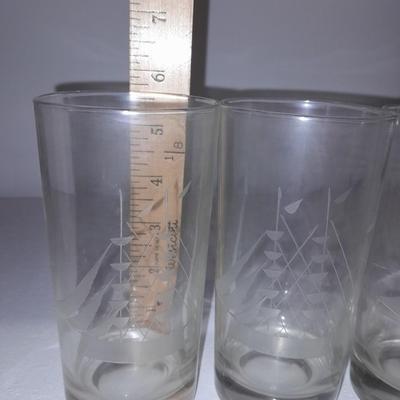 Etched ship drinking glasses with plastic handled drinking mugs.