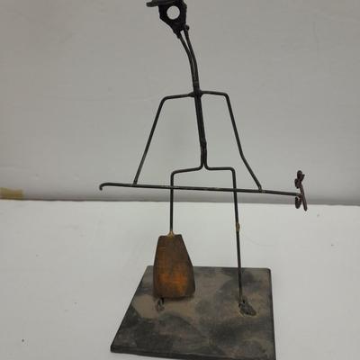 Woven wheat grass windmill, with Hardware made Horsehoe Roping cowboy.