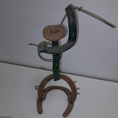 Woven wheat grass windmill, with Hardware made Horsehoe Roping cowboy.