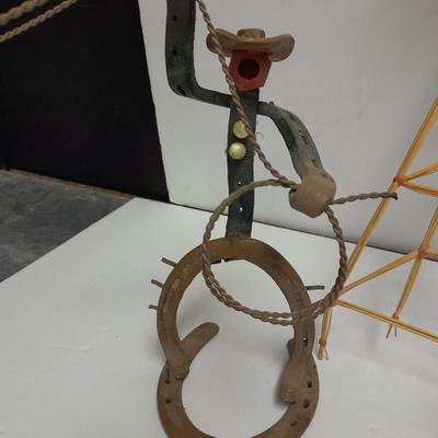 Woven wheat grass windmill, with Hardware made Horsehoe Roping cowboy.