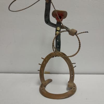 Woven wheat grass windmill, with Hardware made Horsehoe Roping cowboy.