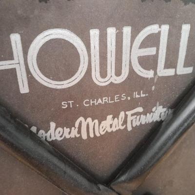 Diningroom table with 4 matching Howell chairs, and tablecloth.