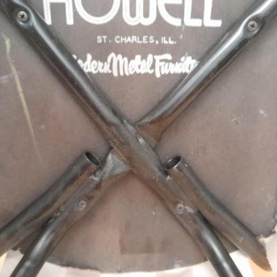 Diningroom table with 4 matching Howell chairs, and tablecloth.