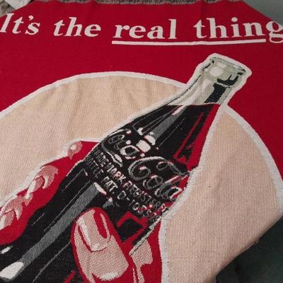 2 blankets, coco-cola and bible verse.