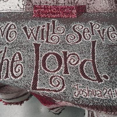 2 blankets, coco-cola and bible verse.