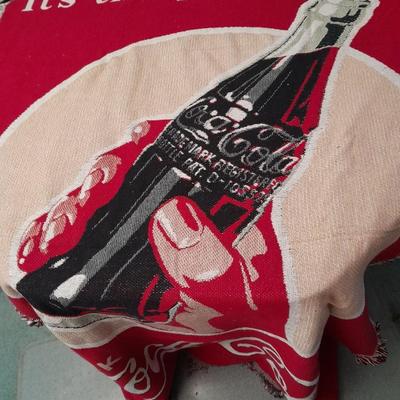 2 blankets, coco-cola and bible verse.