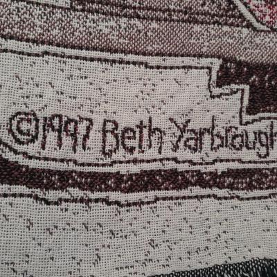 2 blankets, coco-cola and bible verse.