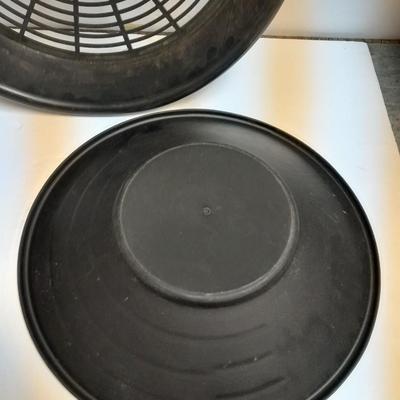 two gold pans and one strainer and a rock pic