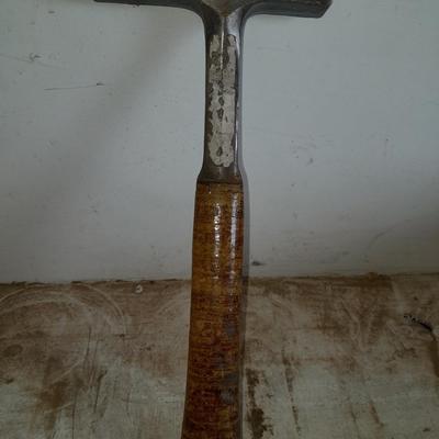 two gold pans and one strainer and a rock pic