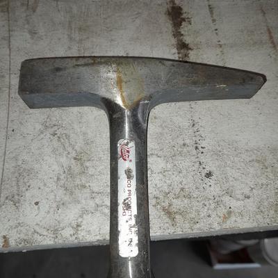 two gold pans and one strainer and a rock pic