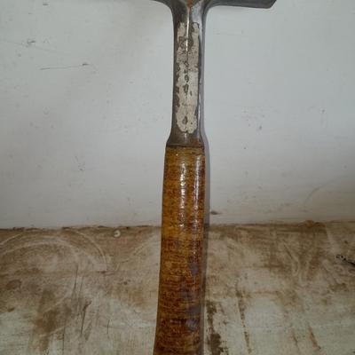 two gold pans and one strainer and a rock pic