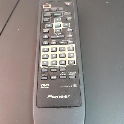 Pioneer DVD player with remote and four DVD movies