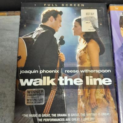 Pioneer DVD player with remote and four DVD movies