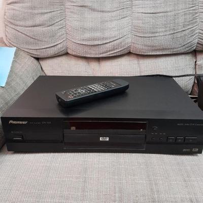 Pioneer DVD player with remote and four DVD movies