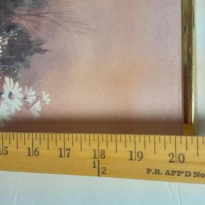 Country famed art work and duck decor.