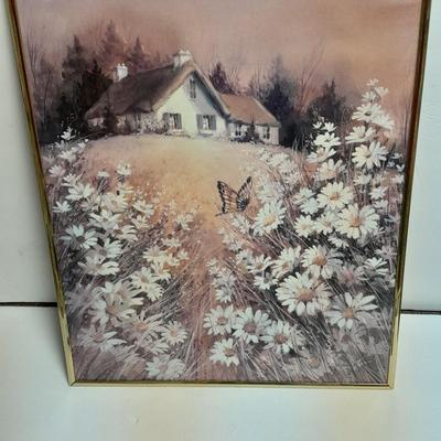 Country famed art work and duck decor.