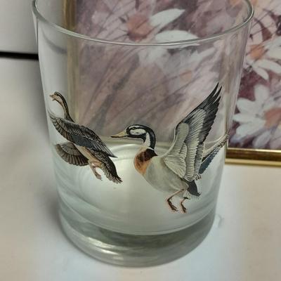 Country famed art work and duck decor.