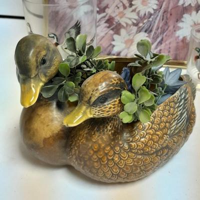 Country famed art work and duck decor.