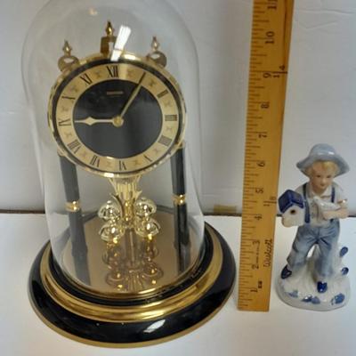 Condor Quartz anniversary clock with glass dome and small little boy blue figure