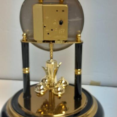 Condor Quartz anniversary clock with glass dome and small little boy blue figure