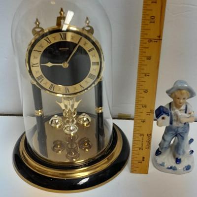Condor Quartz anniversary clock with glass dome and small little boy blue figure
