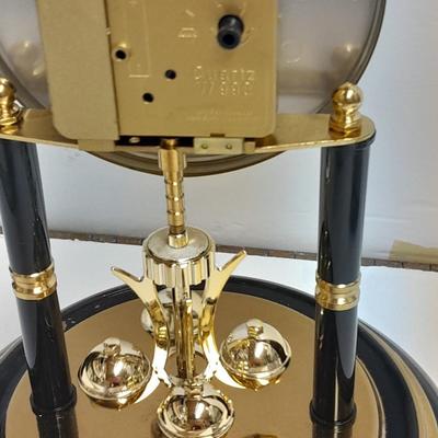 Condor Quartz anniversary clock with glass dome and small little boy blue figure