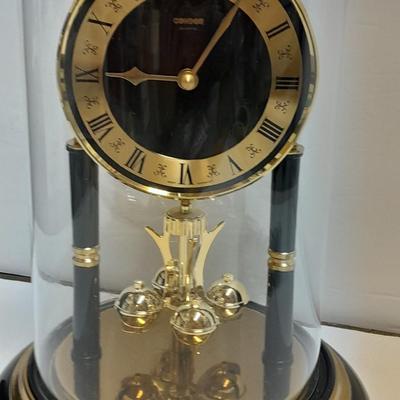 Condor Quartz anniversary clock with glass dome and small little boy blue figure