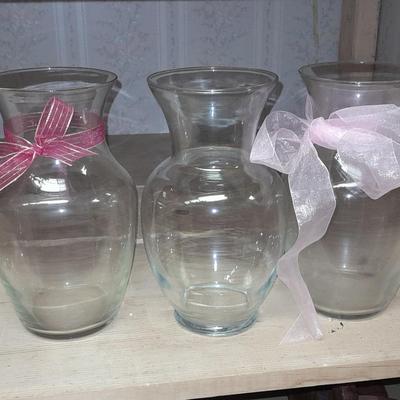 Three matching glass vases