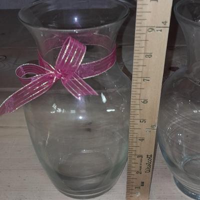 Three matching glass vases