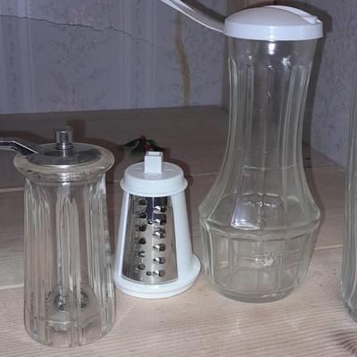 Salad spinner, matching salt, pepper, and spoon rest with other Kitchenware