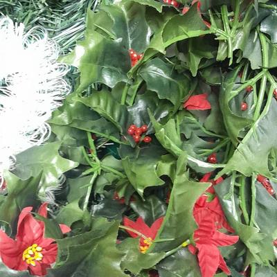 Large light up Christmas star, tree topper, and tinsel Garland