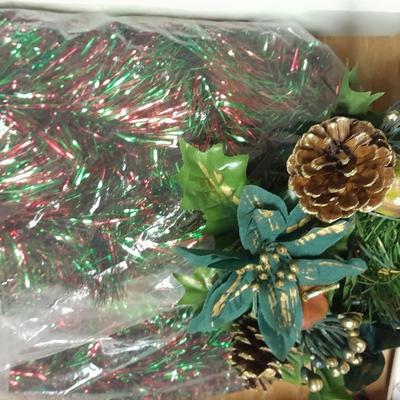 Large light up Christmas star, tree topper, and tinsel Garland