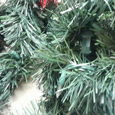 Large light up Christmas star, tree topper, and tinsel Garland