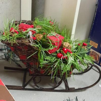 Large light up Christmas star, tree topper, and tinsel Garland