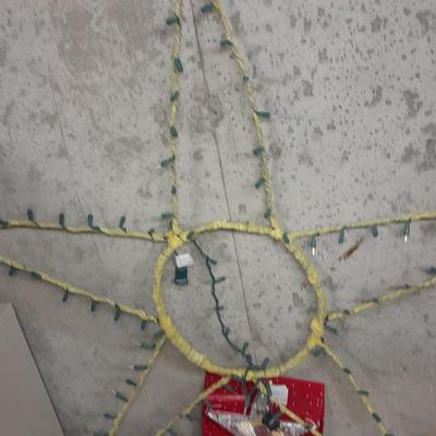 Large light up Christmas star, tree topper, and tinsel Garland