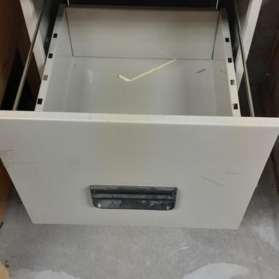 Two drawer Metal filing cabinet with folders and files