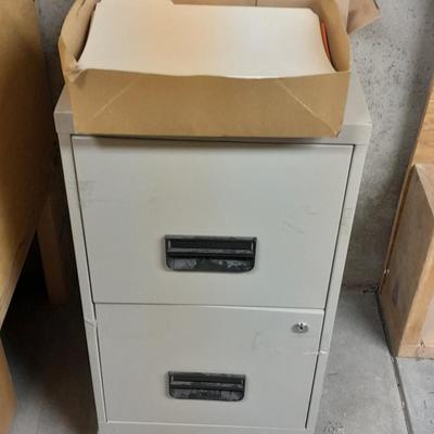 Two drawer Metal filing cabinet with folders and files