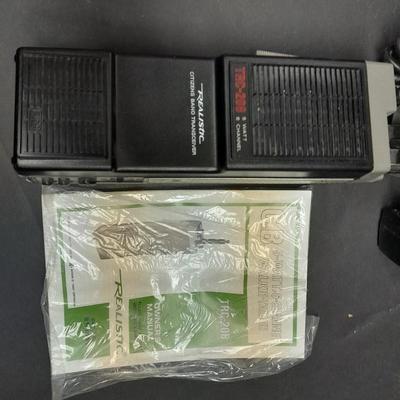 Vintage handheld Realistic CB radio with case and a multi-plug power supply TRC-208 5 watt 6 channel